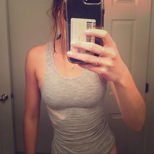 Workout tank with back cut out. SUPER CUTE ON!